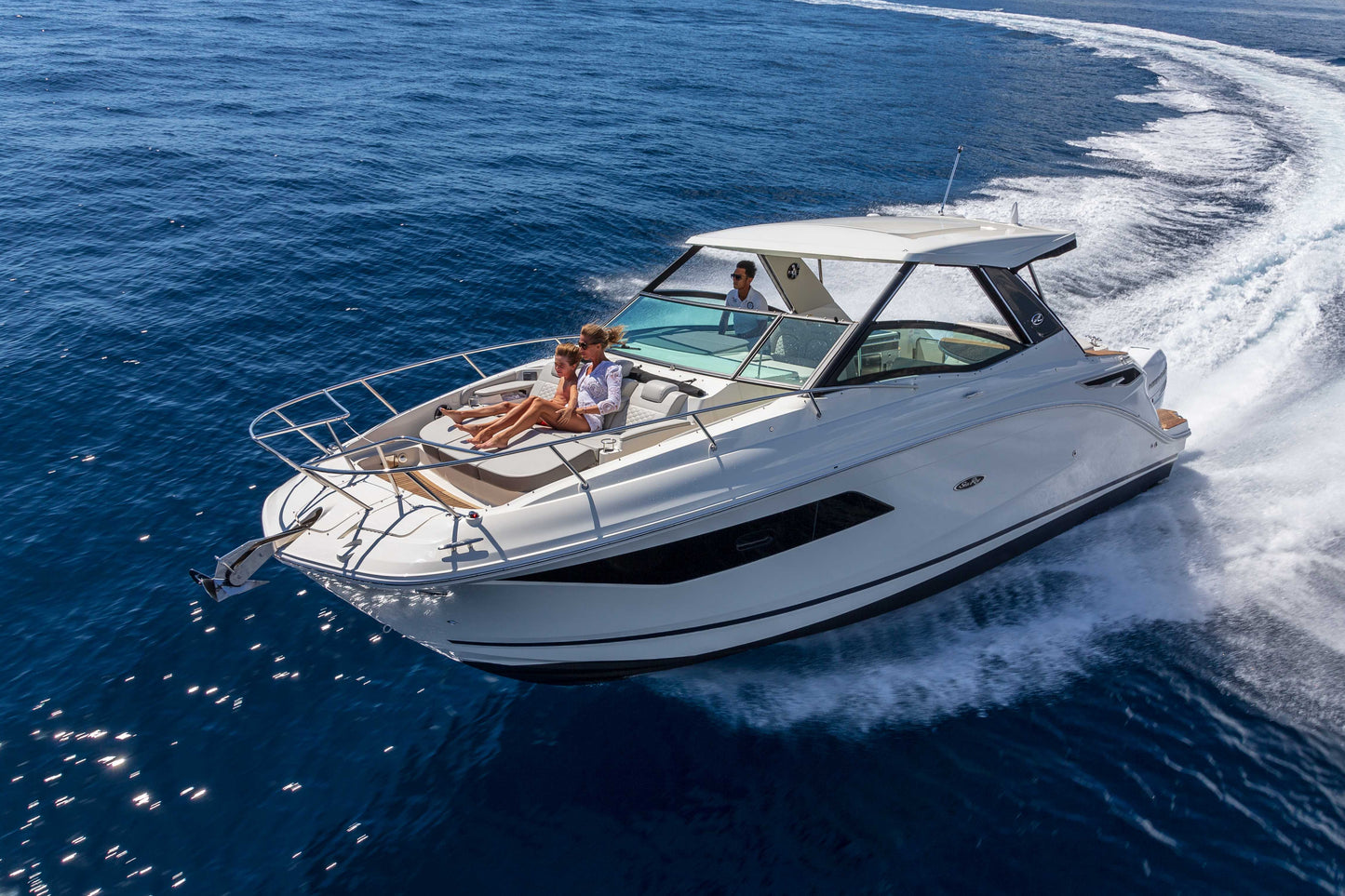Sea Ray 320 yacht cruising near the Sea Caves available for private hire in Ayia Napa