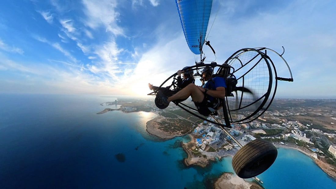 Aerial view of paramotor flight above Ayia Napa beach, new activity 2025