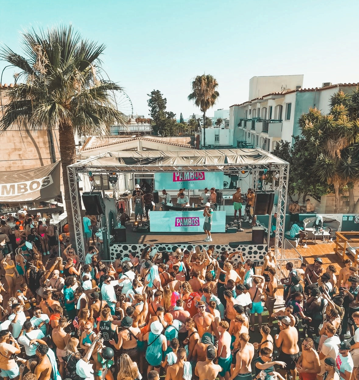 People in front of the stage at the pambos pool party