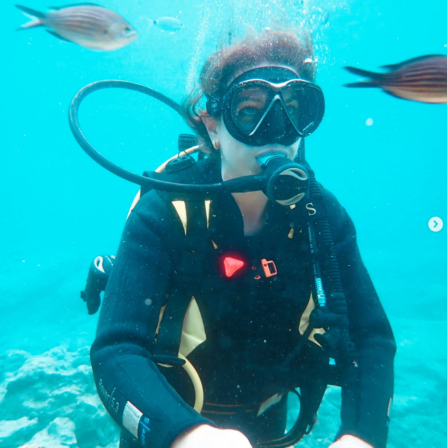 Girl doing scuba diving at green bay in Ayia Napa