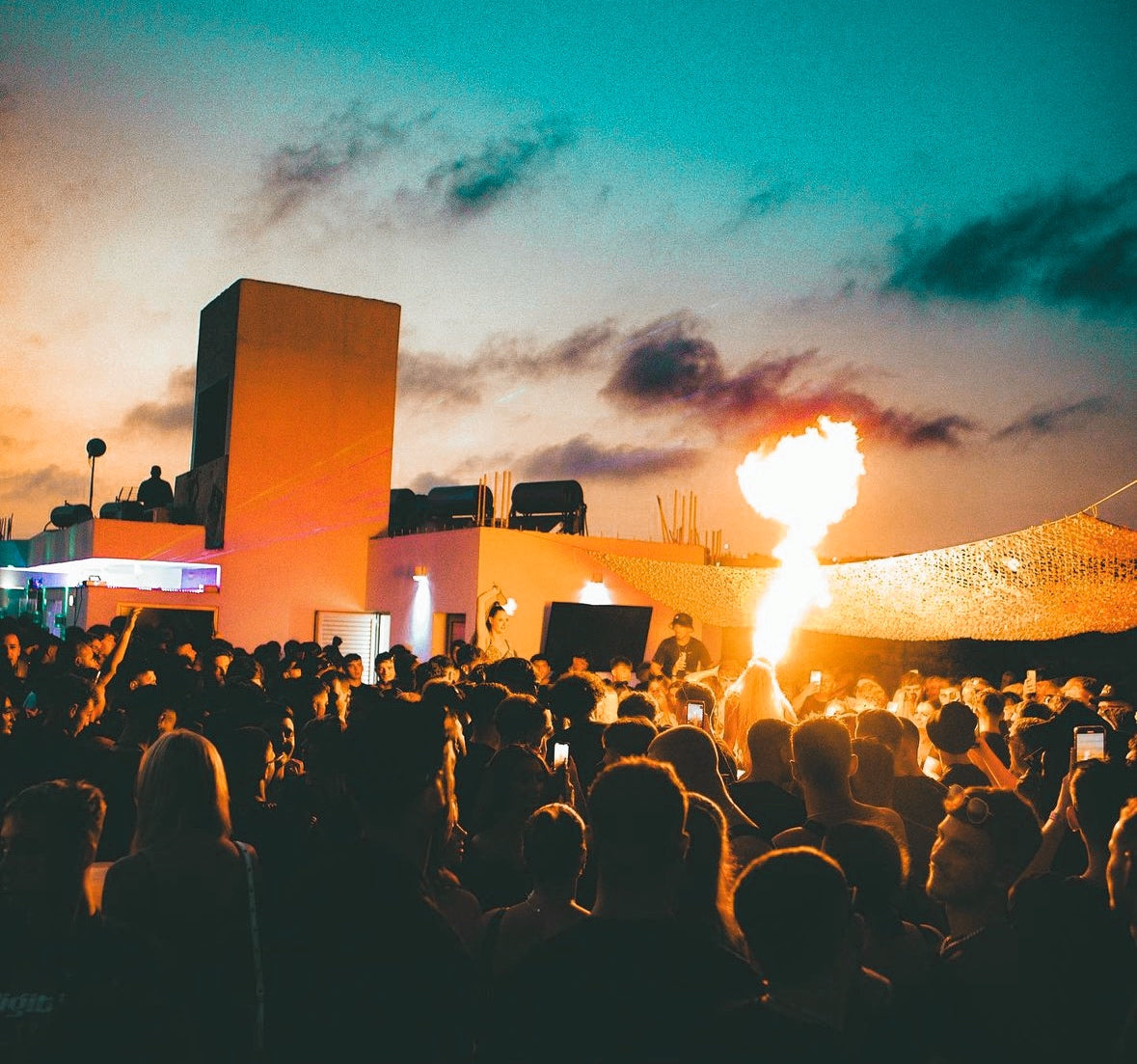 People watching fire show in vice rooftop party in Ayia Napa